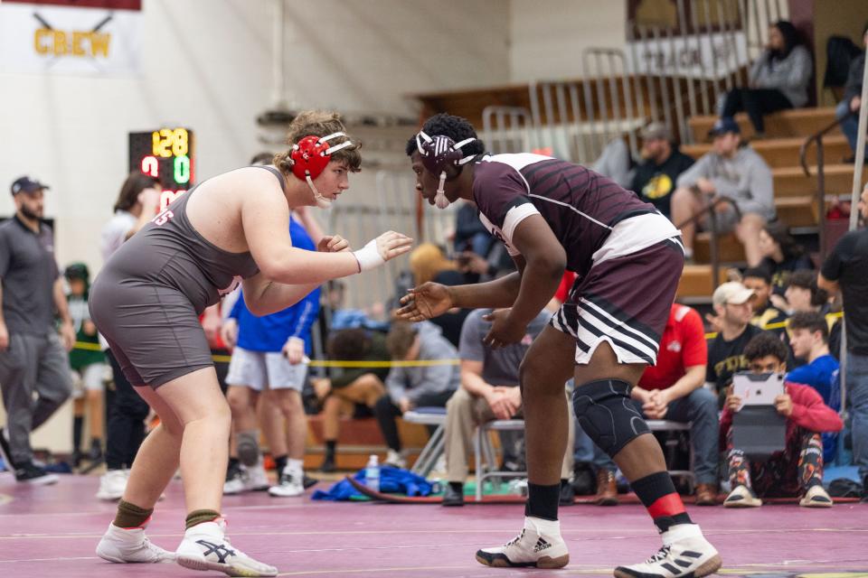 Red Hook's Mark Paschal wrestles Ossining's Marlon Wheatley, left at the 57th Mid-Hudson wrestling Tournament in LaGrange, NY on December 28, 2023.