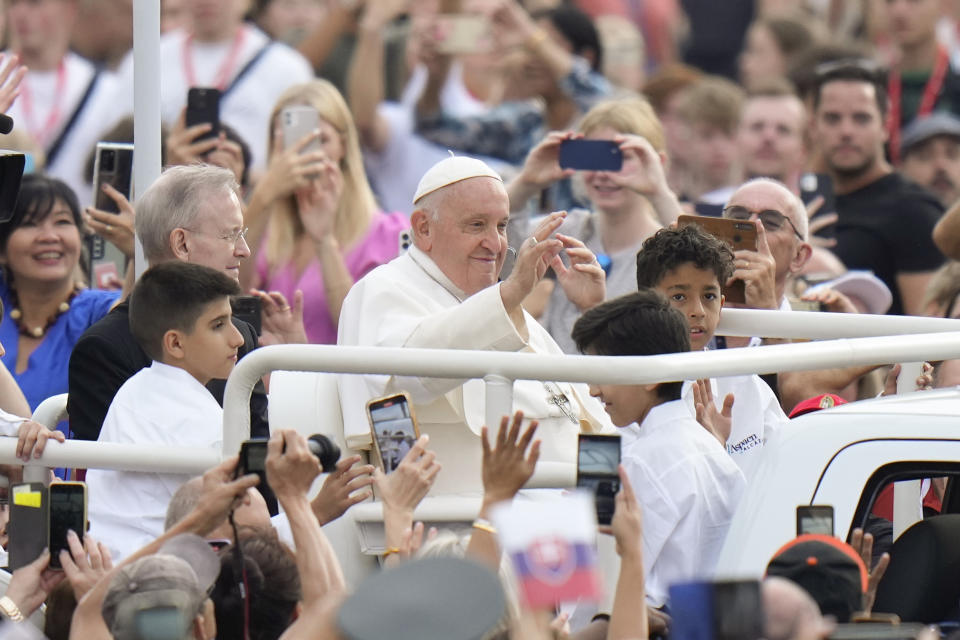 FILE - Pope Francis arrives for his weekly general audience in St. Peter's Square, at the Vatican, Wednesday, Sept. 20, 2023. In October 2023, the Vatican will open an unprecedented gathering of Catholic clergy and laypeople from around the world. The synod is intended to be a collegial, collaborative event. But the agenda includes divisive issues such as the role of women in the church and the inclusion of LGBTQ Catholics. (AP Photo/Alessandra Tarantino, File)