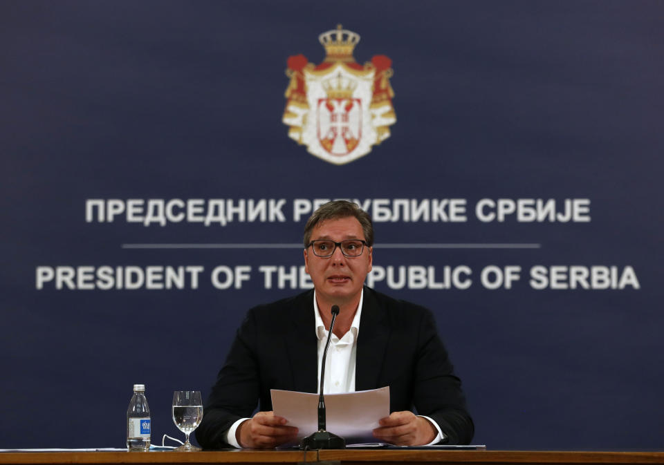 Serbia's President Aleksandar Vucic speaks during a press conference in Belgrade, Serbia, Tuesday, July 7, 2020. Serbia's president has announced the reintroduction of a curfew in Serbia after the highest single-day spike in deaths from the coronavirus. Vucic on Tuesday described the virus situation in Belgrade as "alarming" as hospitals in the capital are leaching their limits. (AP Photo/Darko Vojinovic)