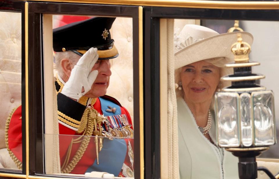 PHOTO: Britain's King Charles and Queen Camilla attend the Trooping the Colour parade to honour him on his official birthday in London, Britain, June 15, 2024.  (Hollie Adams/Reuters)