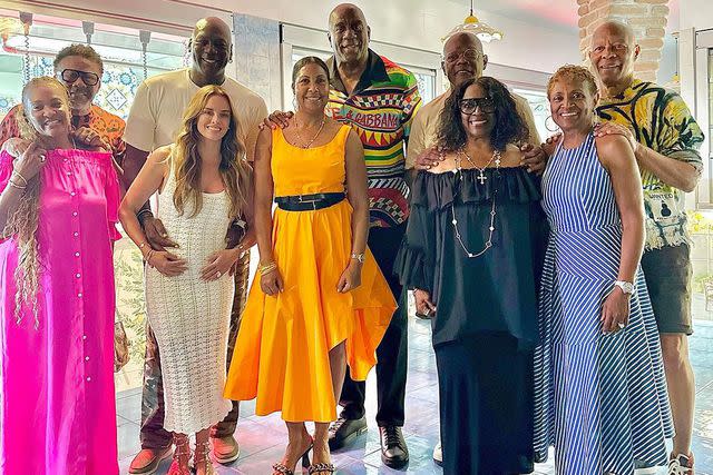 <p>Earvin "Magic" Johnson/Instagram</p> Magic Johnson posing with wife Cookie and pals in Italy.