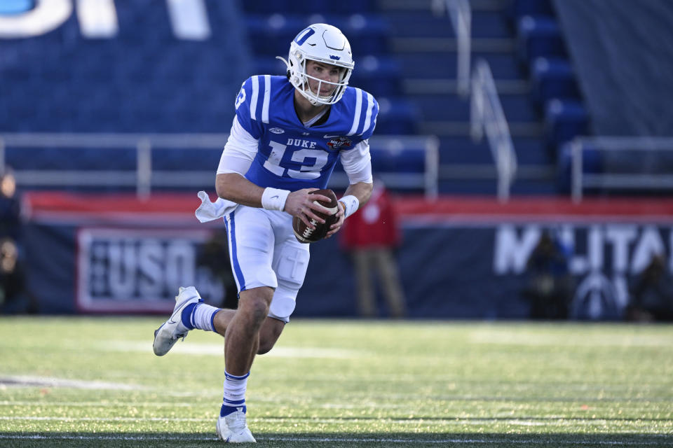 Duke quarterback Riley Leonard (13) runs the ball during the first half of the Military Bowl NCAA college football game against UCF, Wednesday, Dec. 28, 2022, in Annapolis, Md. (AP Photo/Terrance Williams)