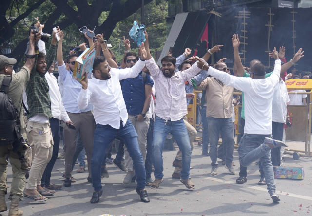 Supporters of opposition Congress party dance as they celebrate election results in the Karnataka state elections in Bengaluru, India, Saturday, May 13, 2023. Elections in India's southern state of Karnataka were held on May 10. Elections in India's southern state of Karnataka were held on May 10. (AP Photo/Aijaz Rahi)