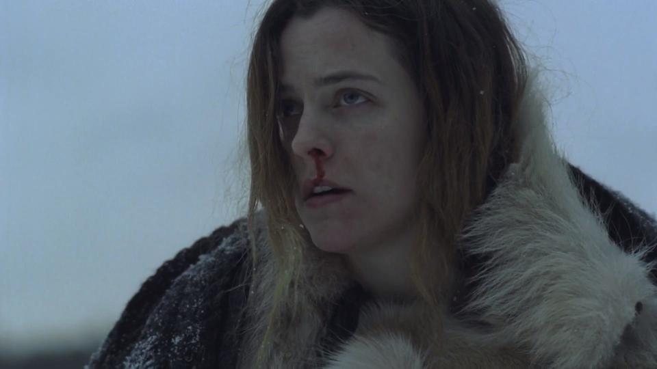 Grace (Riley Keough) is stuck in a snowed-in house with her fiance's children when things go awry in "The Lodge."