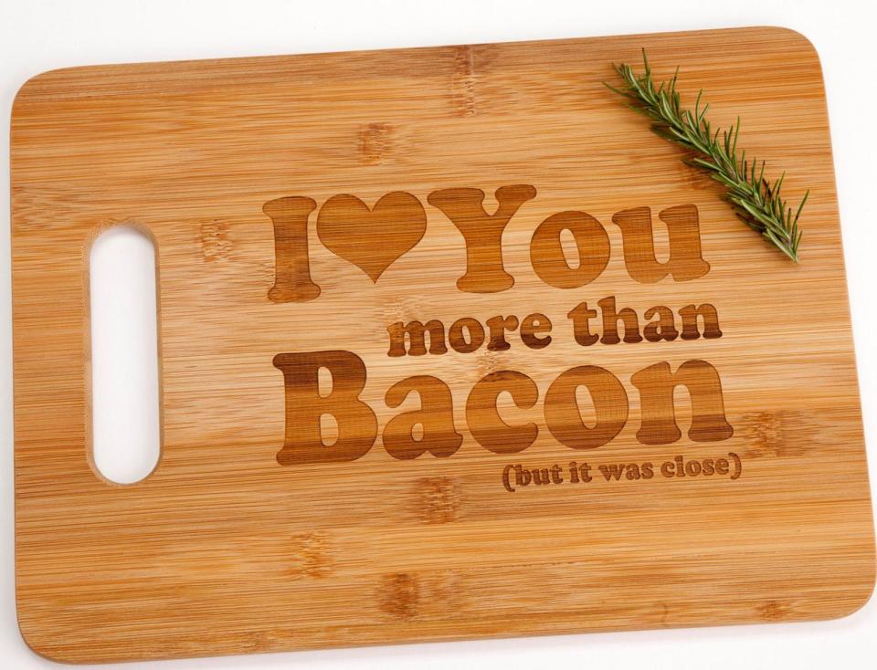 I Love You More Than Bacon Engraved Cutting Board. (Photo: Etsy)