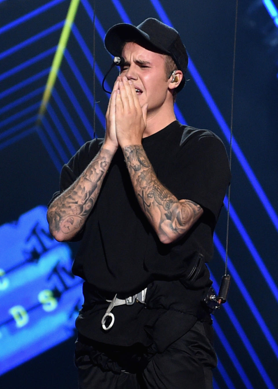 Justin Bieber emotionally performing on stage