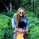 <p>While taking a stroll, Bey and Blue are caught in a candid moment.</p>