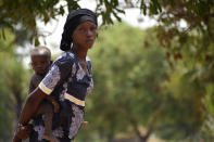 28-year-old Milla Nemoudji, a woman who was divorced by her husband following years of physical abuse, is photographed in a village of Binmar, Chad, Friday, July 19, 2024. (AP Photo/Robert Bociaga)