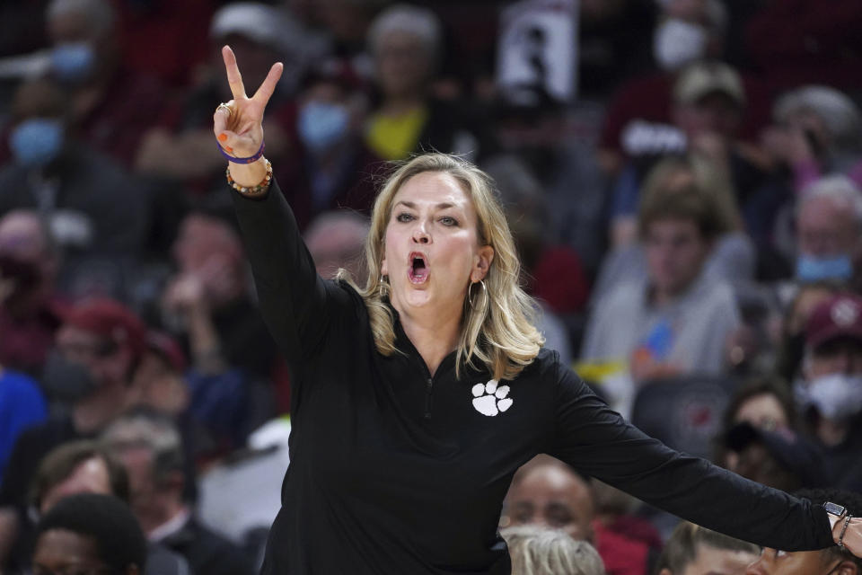 Clemson coach Amanda Butler signals to players during the first half of the team's NCAA college basketball game against South Carolina on Wednesday, Nov. 17, 2021, in Columbia, S.C. (AP Photo/Sean Rayford)
