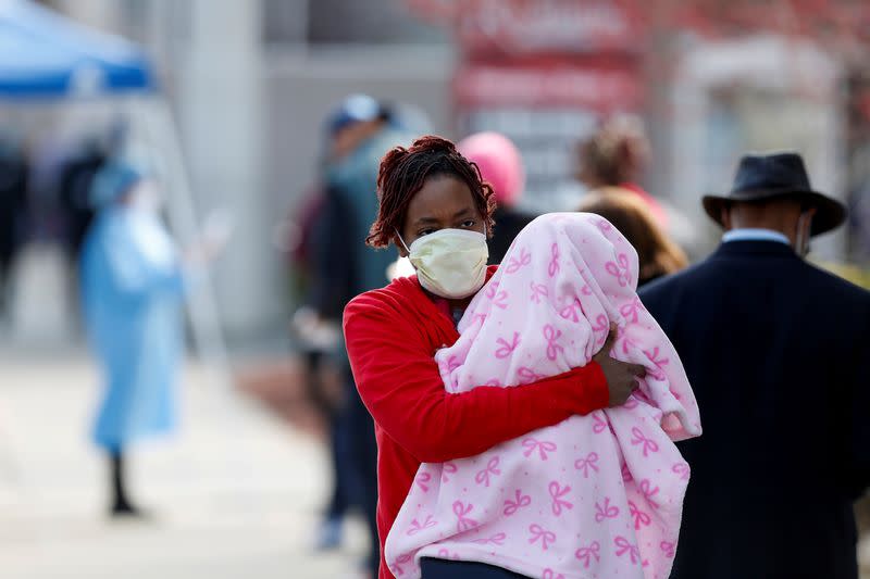 People wait in line to receive testing during the global outbreak of the coronavirus disease (COVID-19) in Chicago