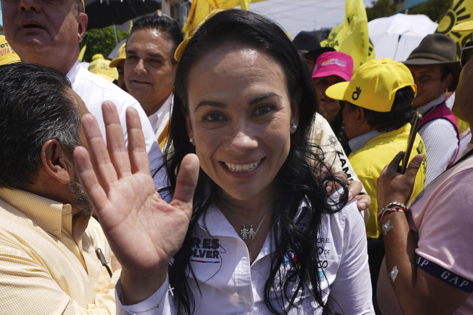 Alejandra del Moral, who is running for Mexico state governor with the PRI-PAN-PRD coalition, campaigns in Nezahualcoyotl, Mexico, Saturday, May 27, 2023. Voters in Mexico state go to the polls on June 4 to elect a new governor.(AP Photo/Marco Ugarte)