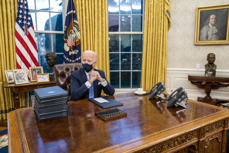 <h1 class="title">Joe Biden Takes Oath Of Office In Capital Under Lockdown</h1><cite class="credit">Bloomberg/Getty Images</cite>