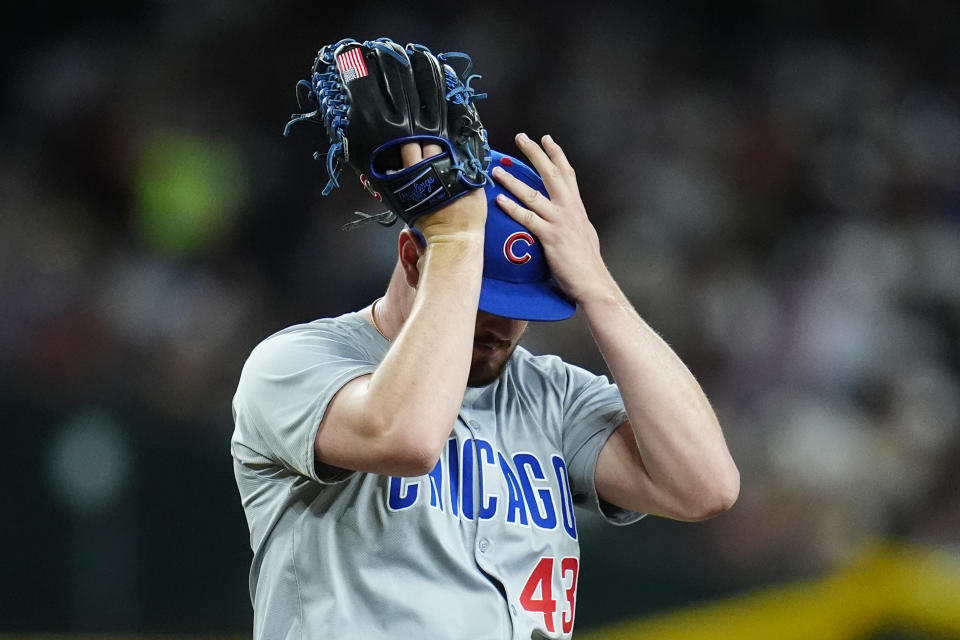 Chicago Cubs relief pitcher Luke Little pauses on the mound during the fifth inning of the team's baseball game against the Arizona Diamondbacks Tuesday, April 16, 2024, in Phoenix. (AP Photo/Ross D. Franklin)