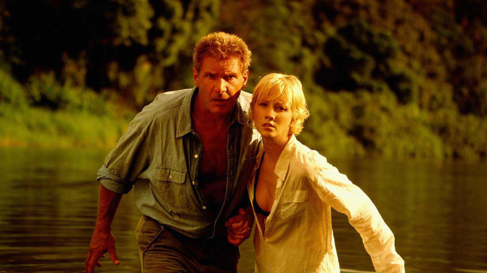 Harrison Ford and Anne Heche in 1998 movie 'Six Days, Seven Nights'. (Credit: Buena Vista Pictures/Getty Images)