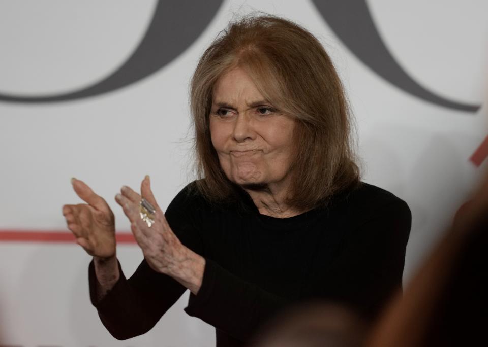 Gloria Steinem, Journalist and Activist claps as she walks on the stage during the International Women's Day in Abu Dhabi, United Arab Emirates, Wednesday, March 8, 2023. (AP Photo/Kamran Jebreili)
