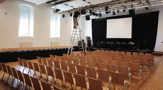 Workers prepare the main hall of the Ritterakademie for the trail against Oskar Groening Photo: APrn Germany,