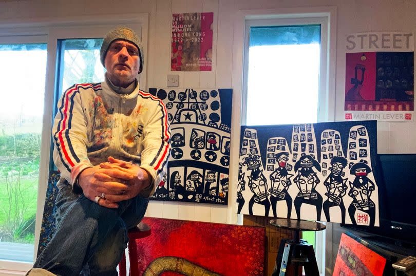 Martin Lever in his studio with pieces from his latest collection