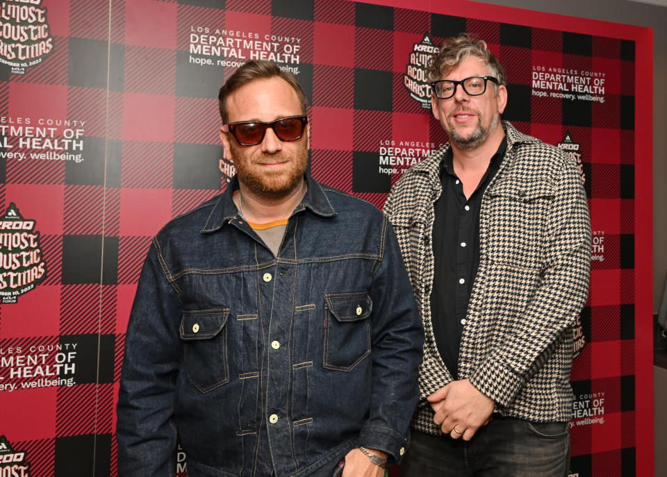 INGLEWOOD, CALIFORNIA - DECEMBER 10: (L-R) Dan Auerbach and Patrick Carney of The Black Keys attend Audacy's "KROQ Almost Acoustic Christmas" at The Kia Forum on December 10, 2022 in Inglewood, California. (Photo by Lester Cohen/Getty Images for Audacy)