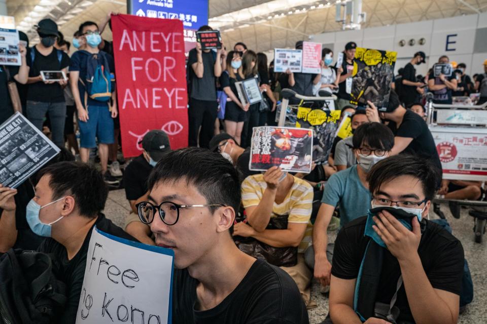 Protesters occupy the departure hall of the Hong Kong International Airport during a demonstration on August 12, 2019.