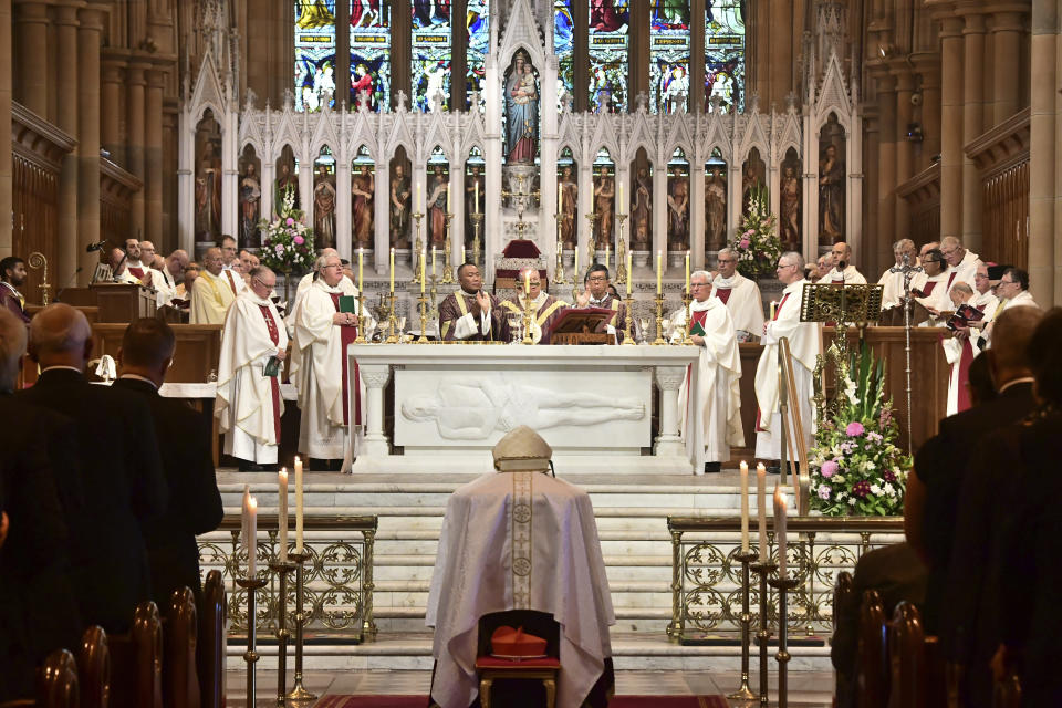 A requiem mass is held for Cardinal George Pell at St. Mary's Cathedral in Sydney, Thursday, Feb. 2, 2023. Pell, who died last month at age 81, spent more than a year in prison before his sex abuse convictions were overturned in 2020. (Giovanni Portelli/Pool Photo via AP)