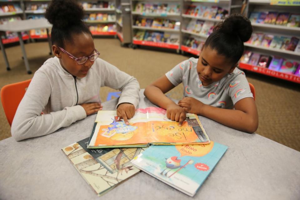 Students read a book in Topeka, Kansas, where the Brown v Board case began. (Photo: Topeka Public Schools)
