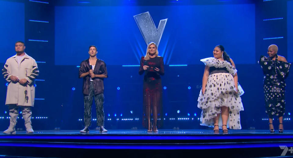 The Voice finalists standing on stage waiting for Sonia to announce the winner.