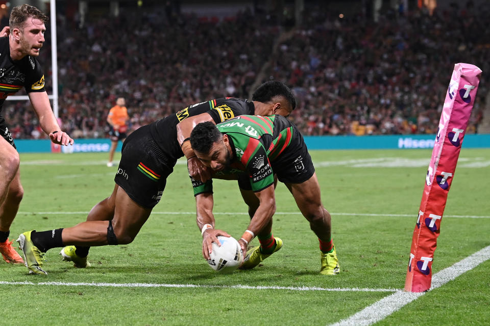  Alex Johnston (pictured) scores a try during the 2021 NRL Grand Final.