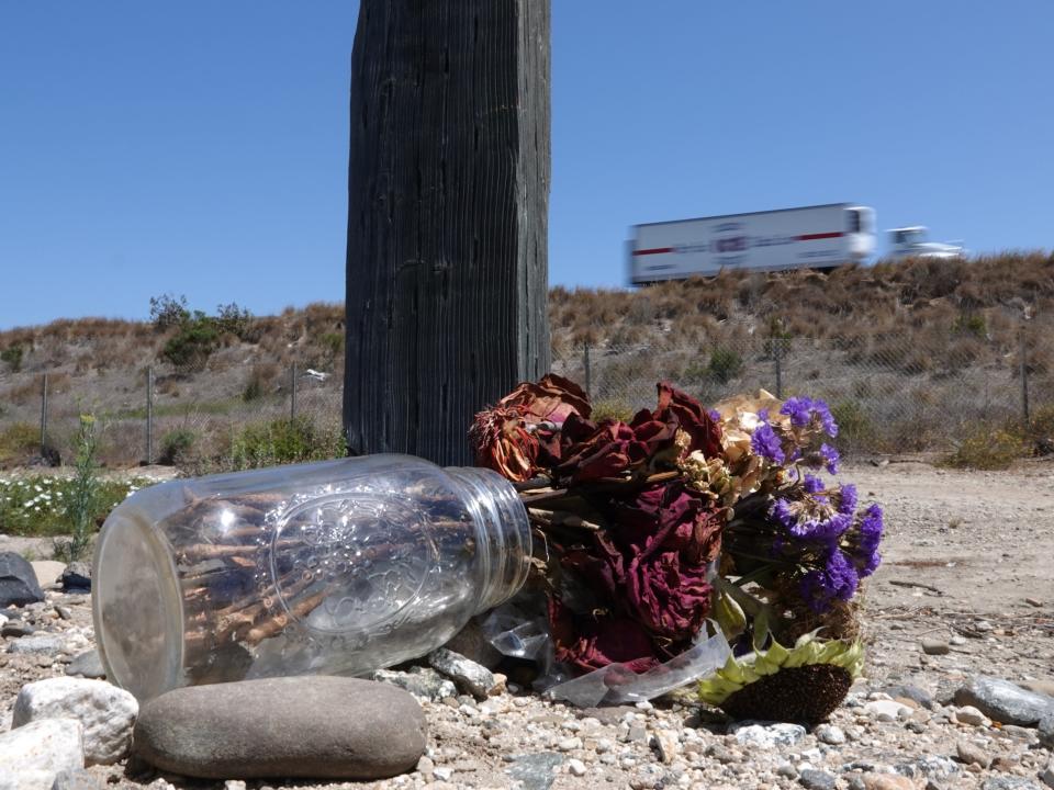 Flowers left near the accident site on southbound Highway 101 in Ventura were a 16-year-old girl was killed in a crash on June 20, 2021. The driver pleaded guilty on Thursday to felony DUI.