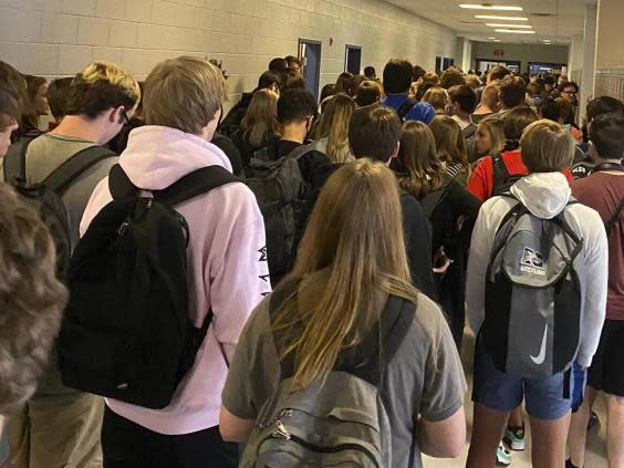 Students crowd a hallway, Tuesday, 4 August 2020, at North Paulding High School in Dallas, Georgia (AP)