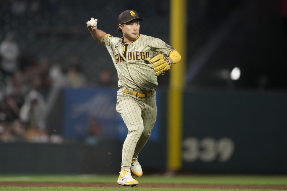 San Diego Padres third baseman Ha-Seong Kim throws out San Francisco Giants' Patrick Bailey at first base during the second inning of a baseball game in San Francisco, Monday, Sept. 25, 2023. (AP Photo/Jeff Chiu)