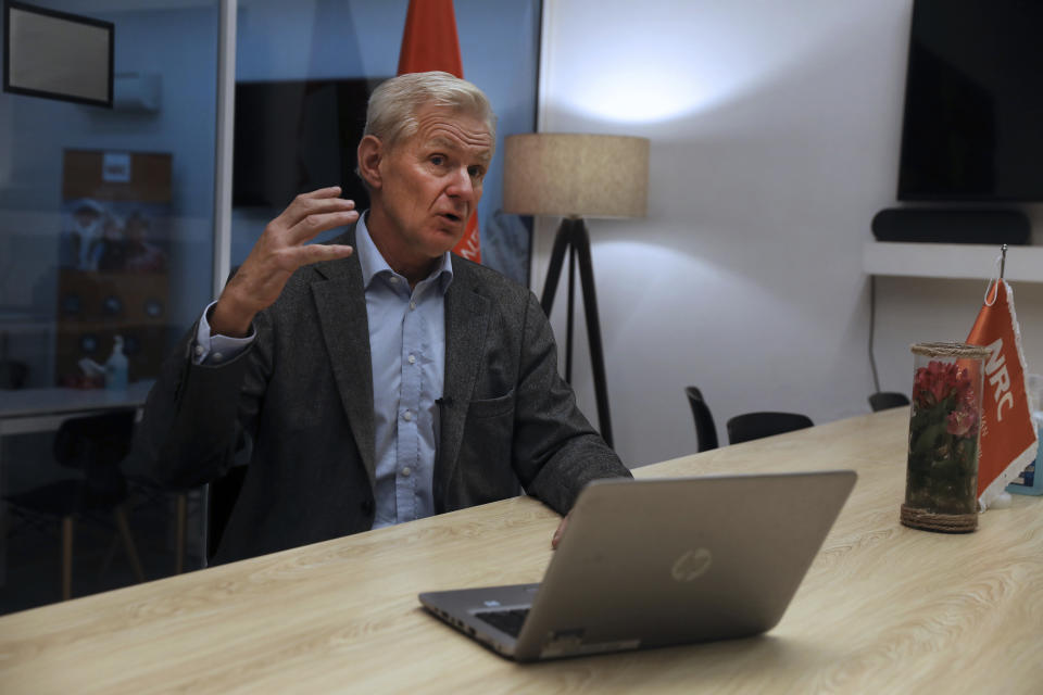 Secretary General of the Norwegian Refugee Council, NRC, Jan Egeland speaks in an interview with The Associated Press in Tehran, Iran, Wednesday, Nov. 10, 2021. Thousands of Afghan refugees are fleeing the Taliban into neighboring Iran every day and the trend could become a crisis for Europe, Egeland said Wednesday. (AP Photo/Vahid Salemi)