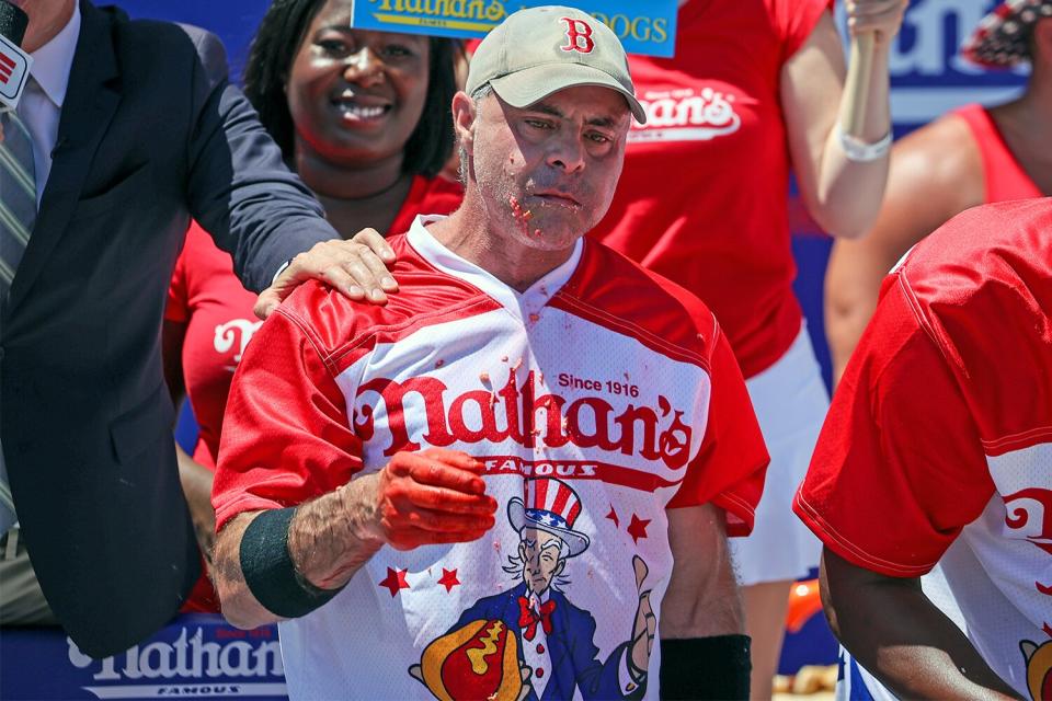 NEW YORK, USA - JULY 04: Geoffrey Esper won second place eating 43 hot dogs in 10 minutes during the men 2022 Nathan's Famous International Hot Dog Eating Contest at Maimonides Park of Coney Island in the Brooklyn borough of New York City, United States on July 4, 2022. (Photo by Tayfun Coskun/Anadolu Agency via Getty Images)