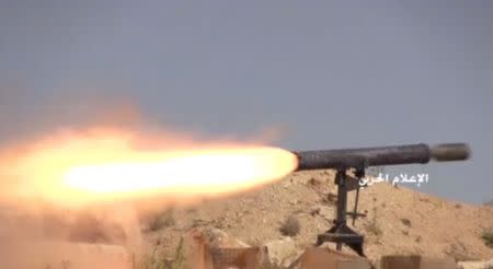 A still image taken from a footage by Hezbollah Military handout uploaded on July 24, 2017, shows a weapon being fired at an unidentified location at the Syrian-Lebanese border. Hezbollah Military/Handout via Reuters TV