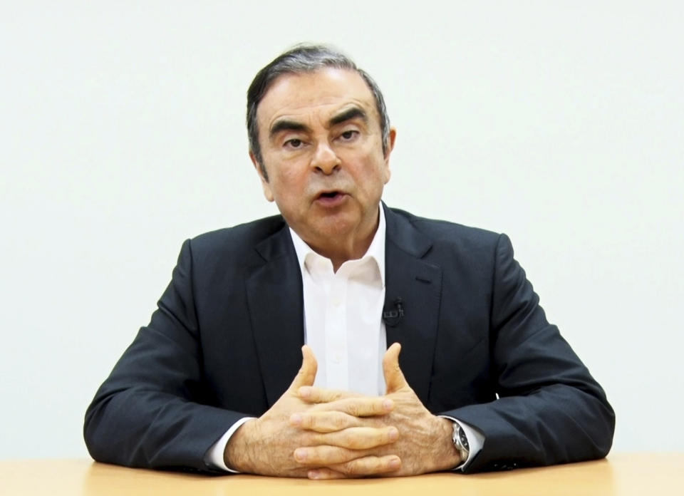 In this image made from video released by Carlos Ghosn via his lawyer Tuesday, April 9, 2019, former Nissan chairman Ghosn speaks on camera in Tokyo. Ghosn, who was arrested in Japan on financial misconduct charges, gets his say in a video shown by his legal team. (Carlos Ghosn via AP)