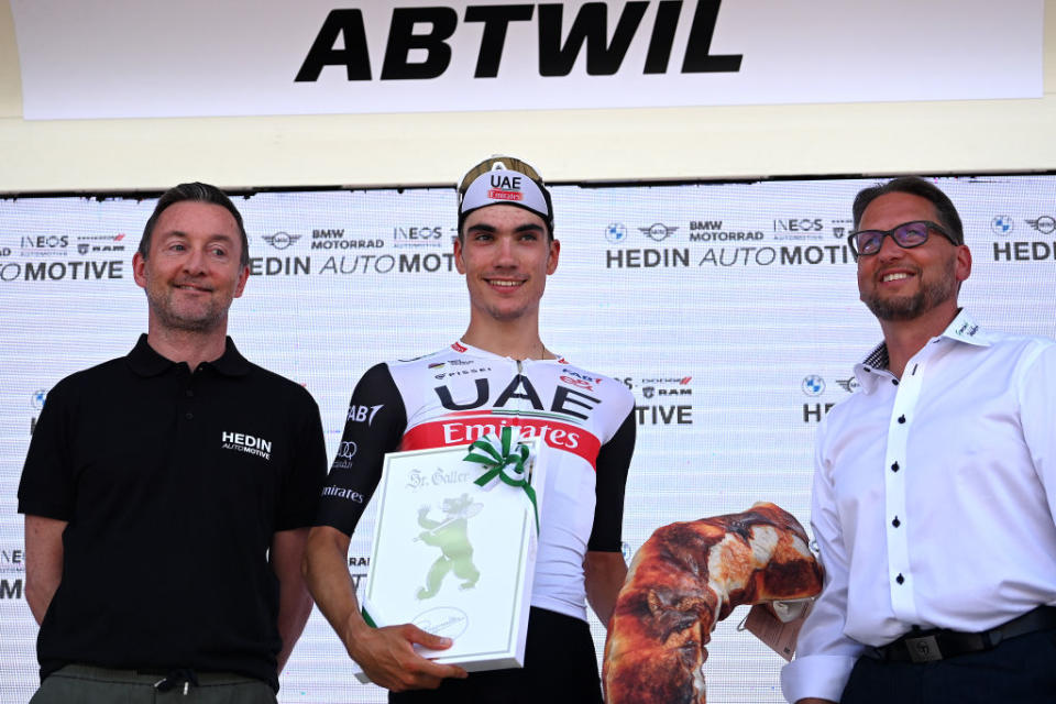 ABTWILL SWITZERLAND  JUNE 18 Juan Ayuso of Spain and UAE Team Emirates celebrates at podium as stage winner during the 86th Tour de Suisse 2023 Stage 8 a 257km individual time trial from St Gallen to Abtwil  UCIWT  on June 18 2023 in Abtwil Switzerland Photo by Tim de WaeleGetty Images