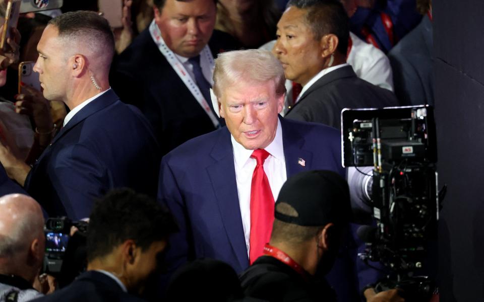 Donald Trump enters the Republican National Convention with a bandaged ear (REUTERS)