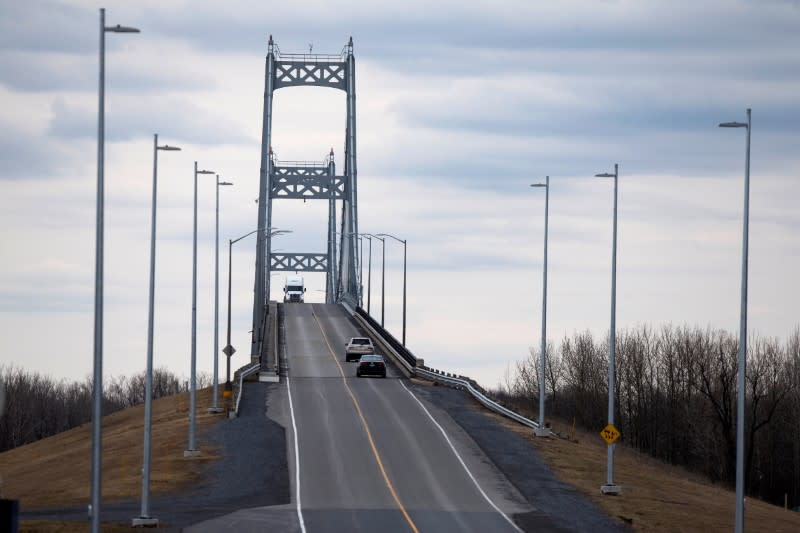 A truck is seen as it drives from the U.S. into Canada on Cornwall Island