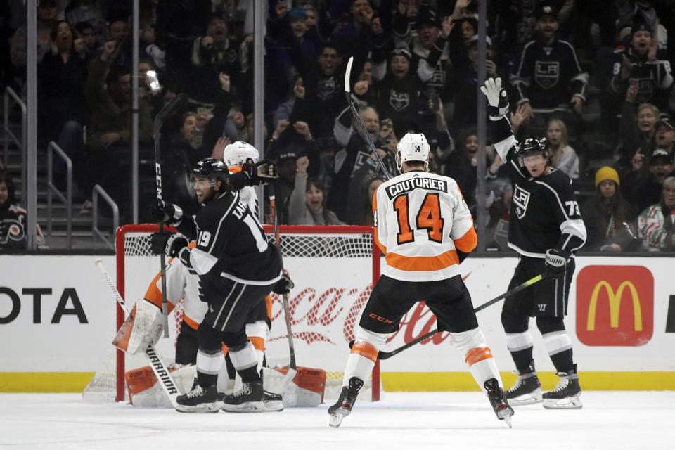 Los Angeles Kings' Alex Iafallo (19) celebrates after scoring against the Philadelphia Flyers during the first period of an NHL hockey game Tuesday, Dec. 31, 2019, in Los Angeles. (AP Photo/Marcio Jose Sanchez)