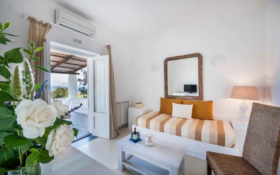 The rooms at Capofaro are simple, white and made for kicking back, barefoot