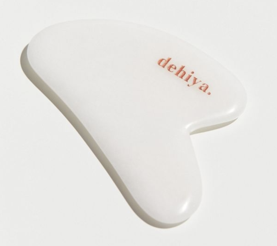 Dehiya Beauty White Jade Facial Gua Sha Tool (Credit: Urban Outfitters)