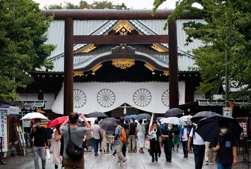 FILE PHOTO: People visit Yasukuni Shrine in Tokyo, Japan