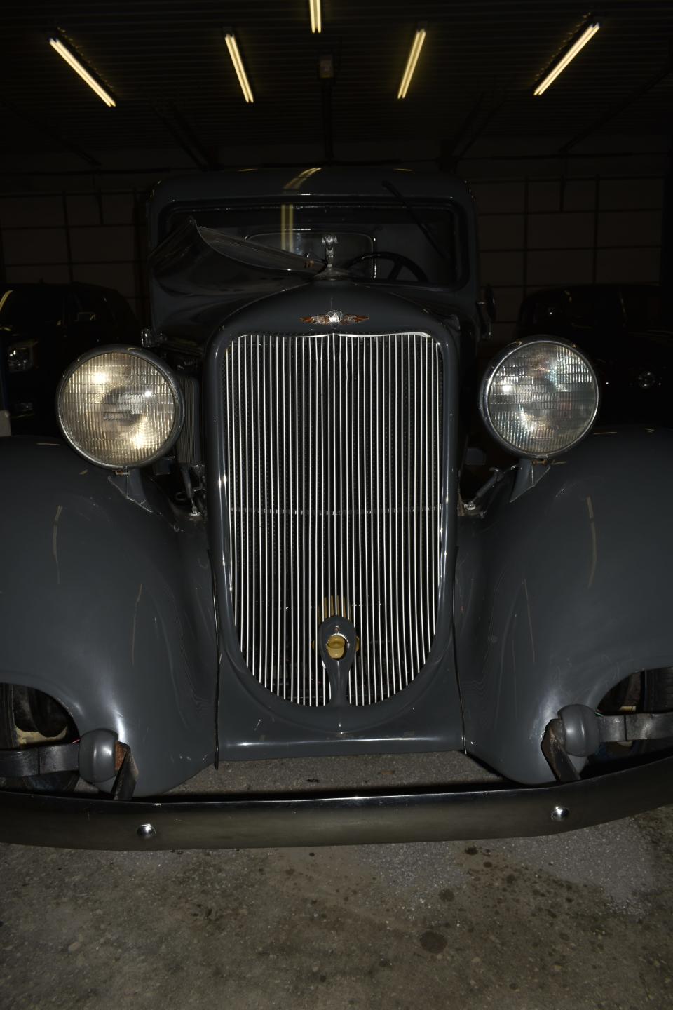 The front end of a 1935 Dodge pickup getting new drum brakes at Gosport Auto Supply.