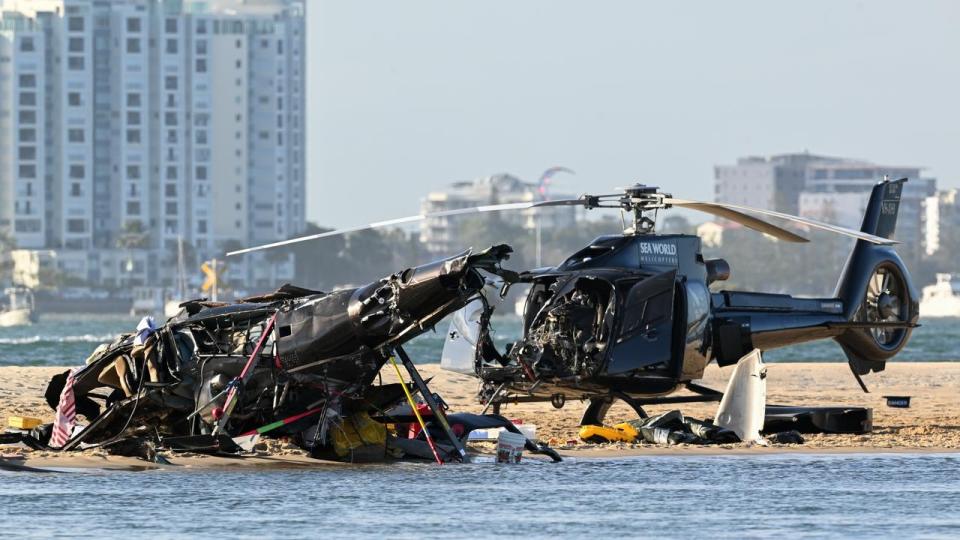 Two helicopters collide mid-air on Australia`s Gold Coast leaving four dead and dozens of others hurt