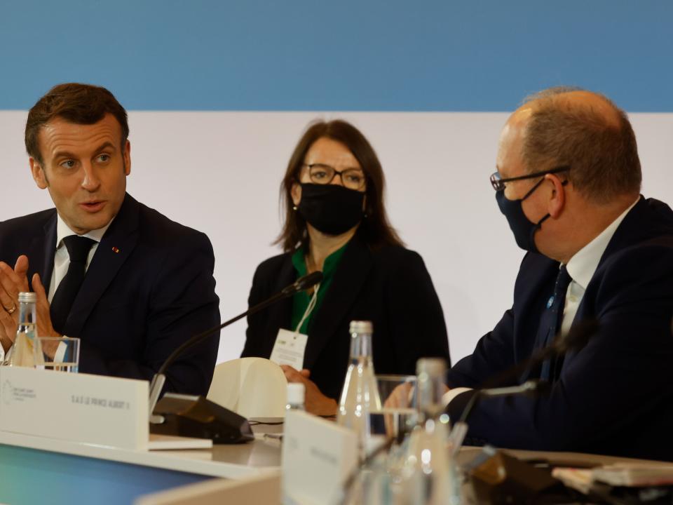 French President Emmanuel Macron (L) speaks with Prince Albert II of Monaco (R), during the One Planet Summit, part of World Nature Day, at the Reception Room of the Elysee Palace, in Paris, on January 11, 2021.