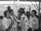 FILE - In this July 4, 1984, file photo, President Ronald Reagan congratulates stock car driver Richard Petty, who won the Firecracker 400 race at the Daytona International Speedway in Daytona Beach, Fla. President Donald Trump will look to rev up his appeal with a key voting demographic Sunday — NASCAR fans — as he takes in the Daytona 500. (AP Photo/Ira Schwarz, File)