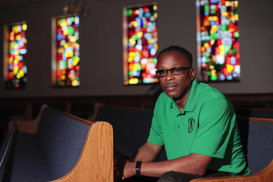 The Rev. Frederick LaMarr, posing for a portrait at Family Missionary Baptist Church in 2021, believes Columbus police led a "good faith effort" of attempting the arrest warrant.
