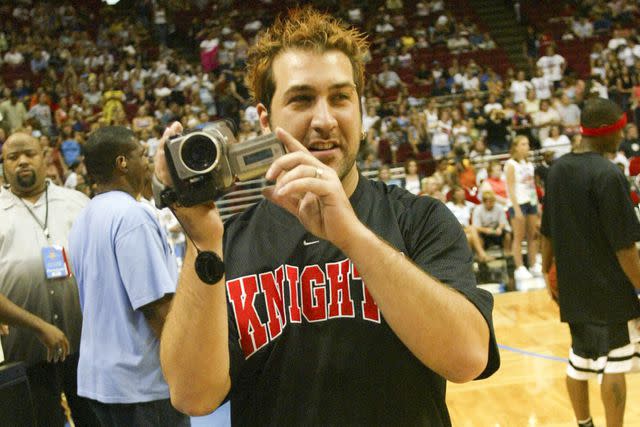 James Devaney/WireImage Joey Fatone holds a video camera in 2002