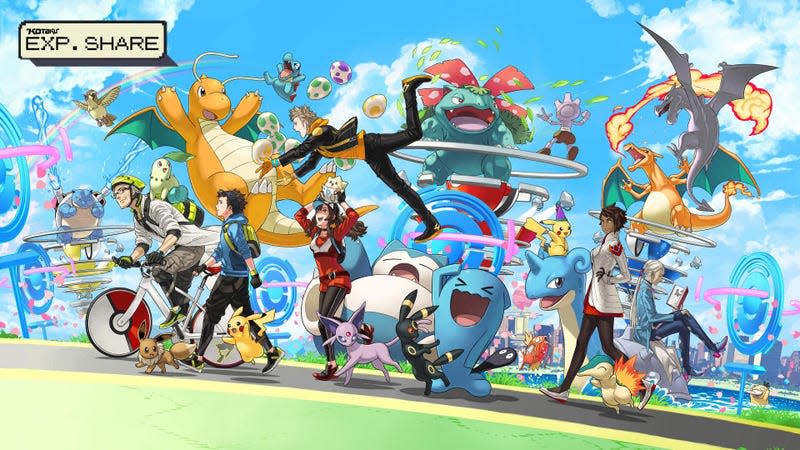 A crowd of trainers and Pokemon are seen walking on a road with PokeStops surrounding them.