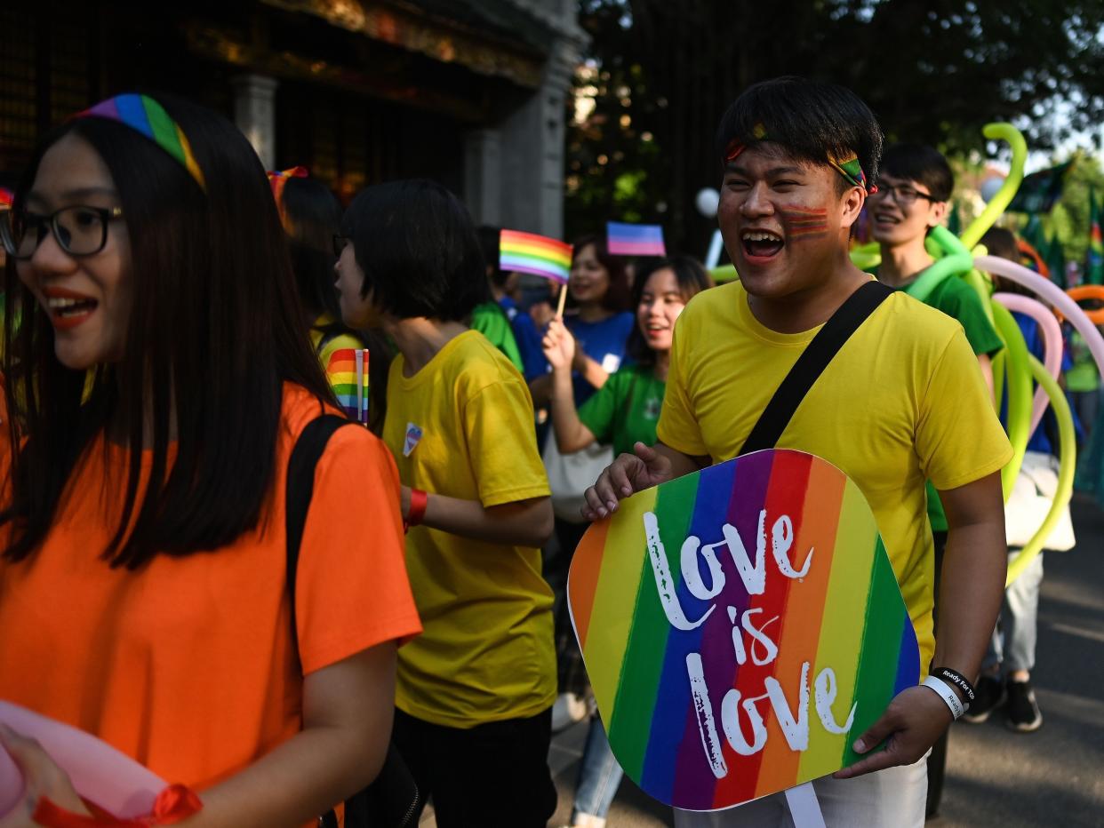 Participants take part in the annual Hanoi Pride 2019 parade, which champions LGBT rights in the country, in Hanoi on September 22, 2019.