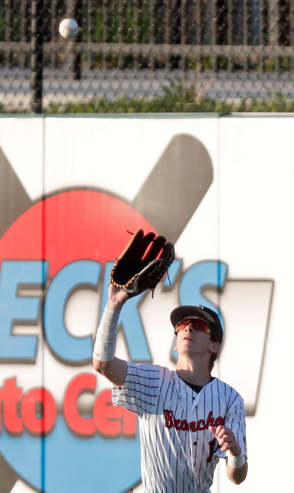 Lafayette Jeff Bronchos Aiden Marcus (15) catches a fly ball during the IHSAA baseball game against the McCutcheon Mavericks, Wednesday, May 3, 2023, at Loeb Stadium in Lafayette, Ind. Lafayette Jeff won 3-2.